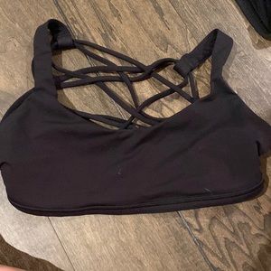 Lulu lemon black sport bra with many crosses in back
